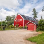 Rode houten schuurwoning
